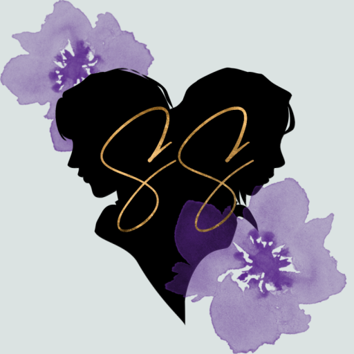 Save Sappho logo: the silhouettes of two women facing away from each other form a heart at the center. At the top left corner and the bottom right corner of the image are violets. Overlaying the women at the center are two rose gold Ss